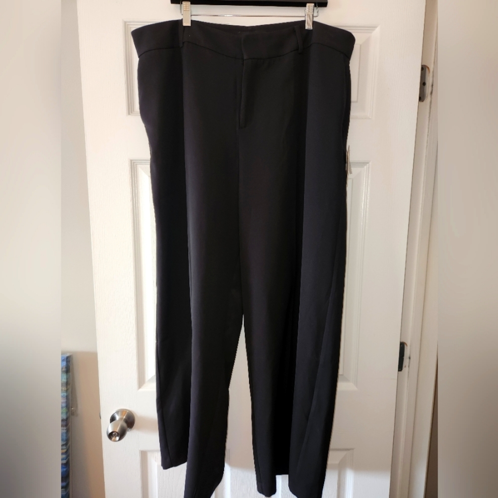 NWT classic ladies black trousers with structured waist and draped wide legs.